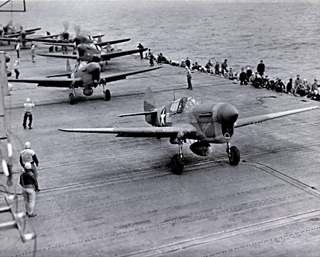 USS Ranger launching P-40s - 1943